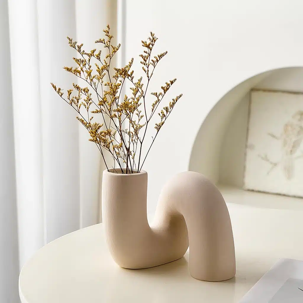 a vase with a plant in it