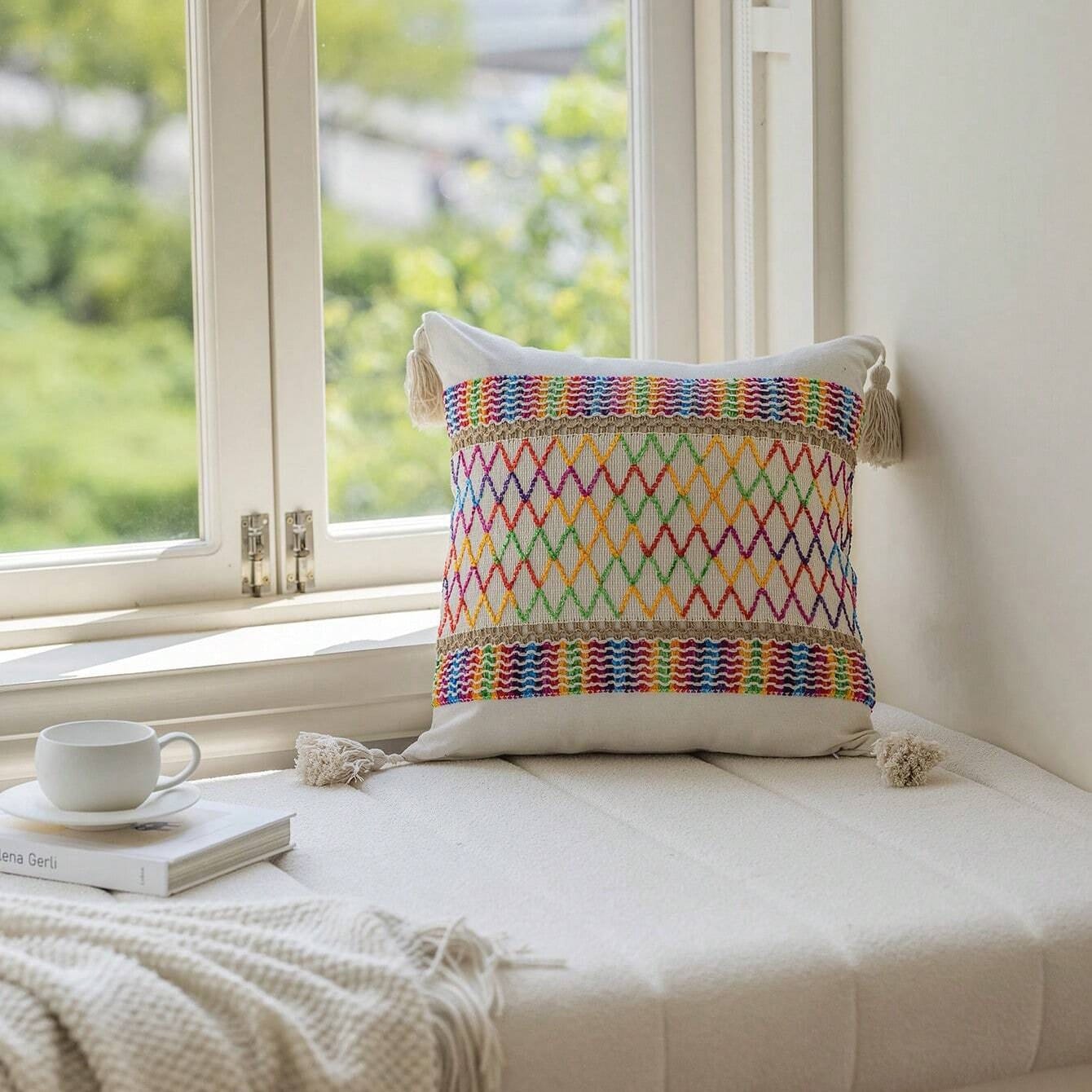 a pillow on a window seat